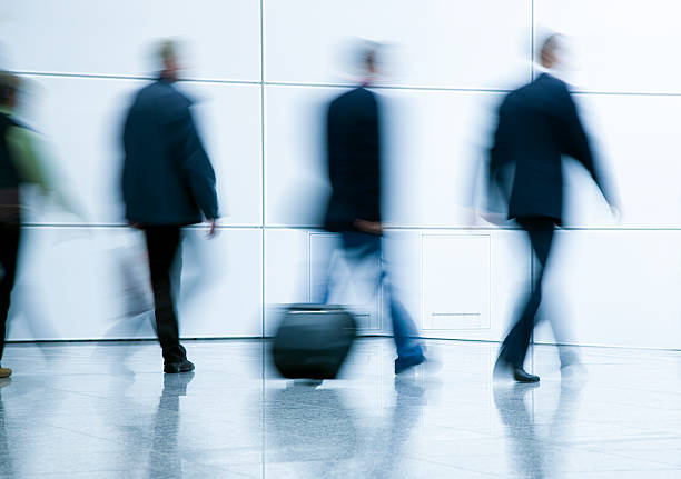 istock Blurred Business People Walking in a Corridor 174619511