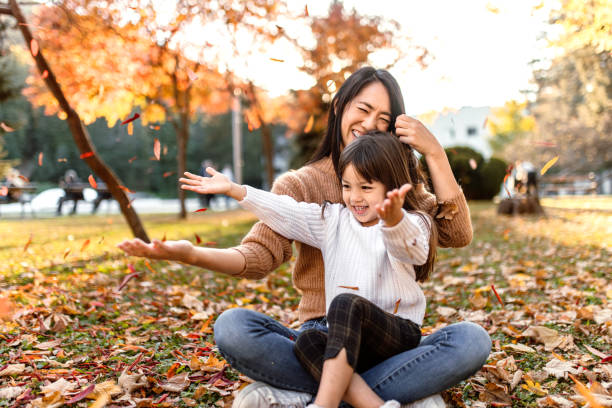 istock Playing in park on sunny autumn day 1746198136