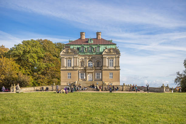 Eremitage Palace, Denmark - October 18th 2023: The famous castle from 1726 is a royal hunting hut and made by the Danish architect Lauritz de Thurah. To day it is a popular meeting point on a sunny day in Dyrehaven which is a public park north of Copenhagen famous for its many deer and an UNESCO World Heritage Site