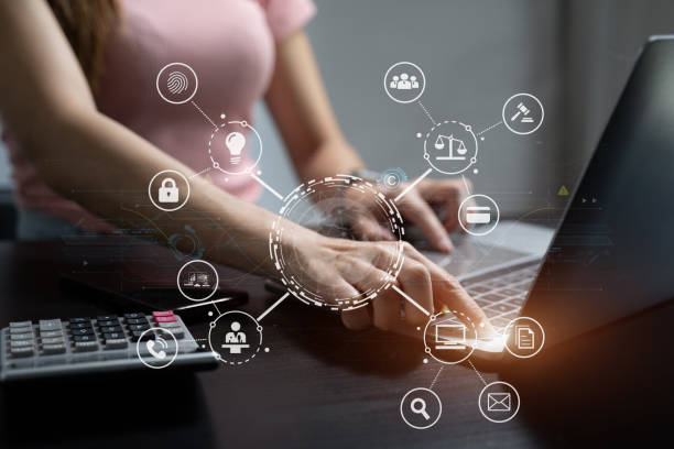 istock Copyright or patent concept, Person hand using laptop computer, tablet and smartphone with virtual screen copyright icon trademark, Creation ownership against piracy at office. 1746203490