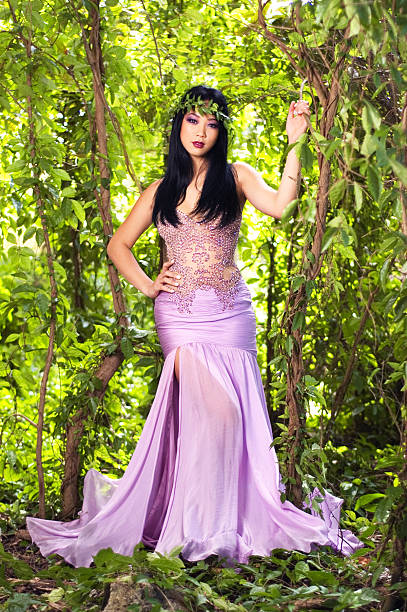 Beauty model in a forest setting.