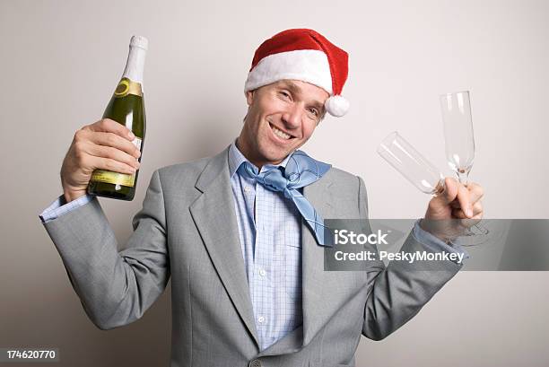 Office Worker Businessman Toasts At Holiday Party Stock Photo - Download Image Now - Bottle, Business, Business Person