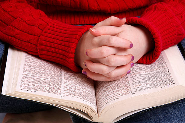 istock Little Girl and Bible 174620891