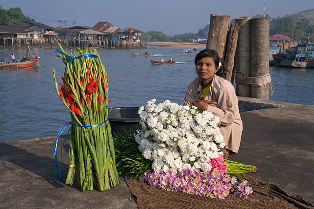 istock Burmese Flower Seller 174621087