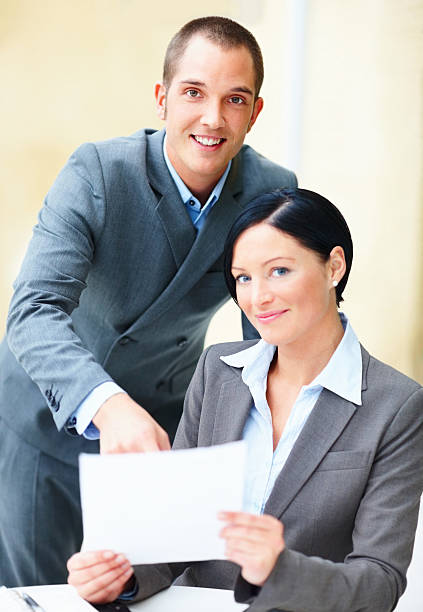 istock Happy young business people together 174621151