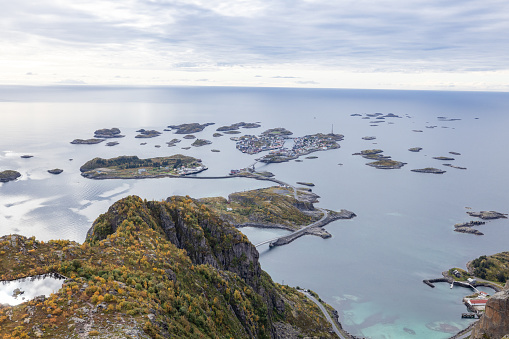 This image shows Aerial view of Henningsvaer archipelago and famous football stadium on Lofoten islands