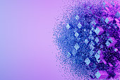 Abstract connected cube exploding with particles, artificial intelligence technology background