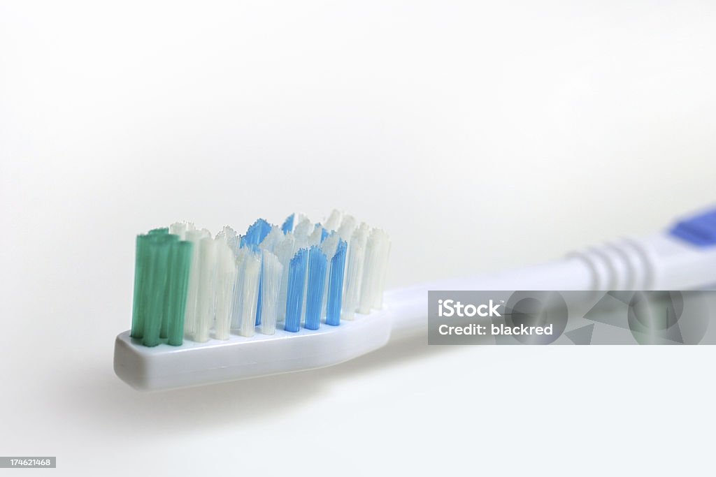 Tooth Brush "Closeup of a tooth brush, isolated on white background.Similar images -" Aspirations Stock Photo