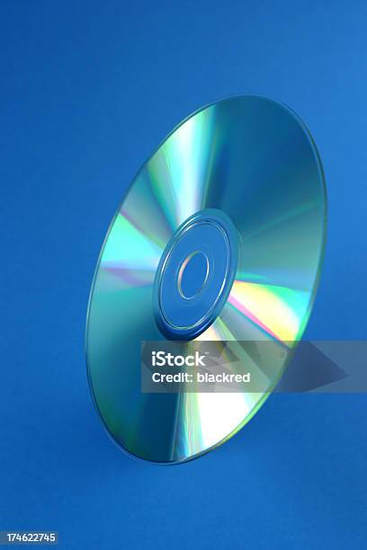 Compact Disc Stock Photo - Download Image Now - Audio Equipment, Blue, Blue Background