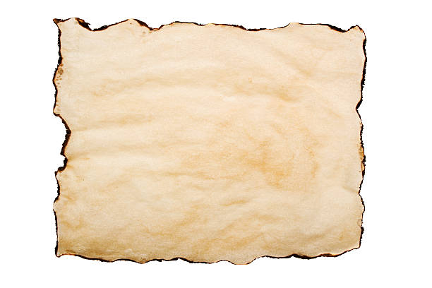 istock Vintage paper background burnt edges worn coffee stained textured 174623189