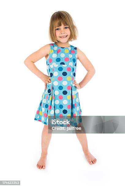 Happy Girl With Hands On Hips On White Background Stock Photo - Download Image Now - Child, Girls, Standing