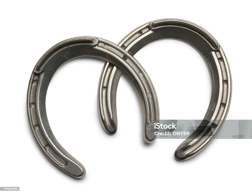Due Lancio dei ferri di cavallo - Foto stock royalty-free di Ferro di cavallo - Accessorio per animali