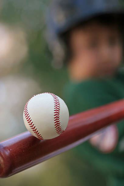 istock Close up still image of a baseball making contact with bat 174624317