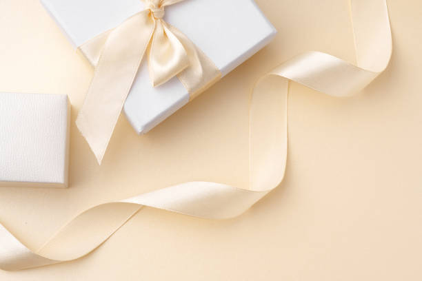 istock White jewelry boxes with silk ribbon close up 1746251515