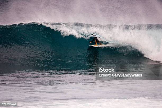 Surfing In The Curl Of A Big Wave Stock Photo - Download Image Now - Activity, Adult, Breaking Wave