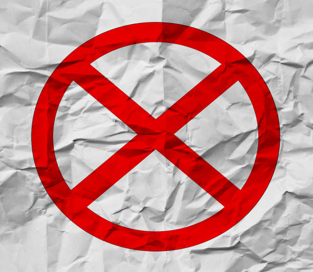 istock Red cross on crumpled paper 1746258732