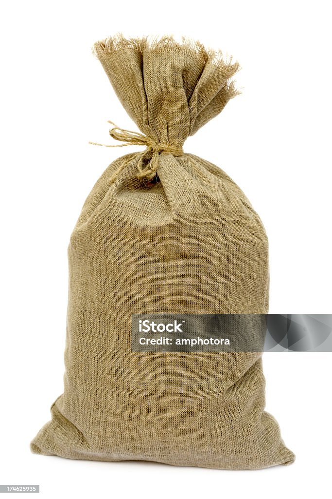 Tied brown hemp sack against a white background Sack - isolated on white background. Burlap Sack Stock Photo