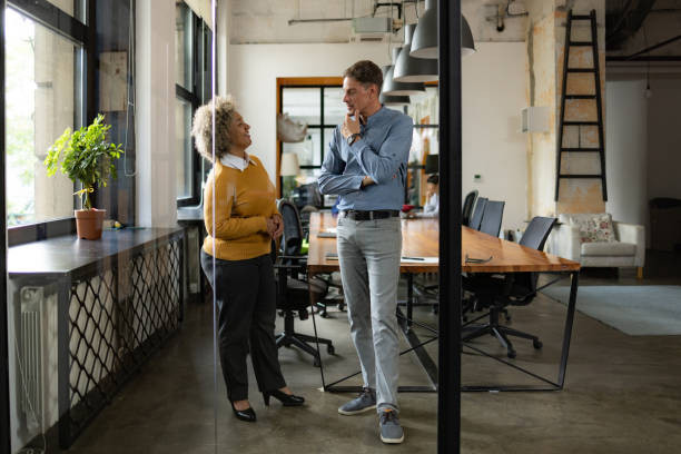 istock Business colleagues talking in the office. 1746261233