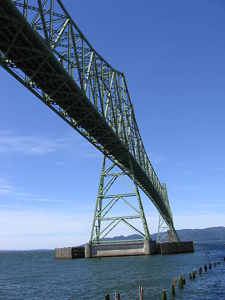 Under the Bridge "Bridge spanning the mouth of the Columbia River, viewed from beneath." tressle stock pictures, royalty-free photos & images