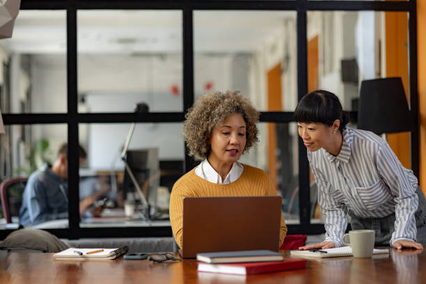 istock Female entrepreneurs working on laptop in the office. 1746265836