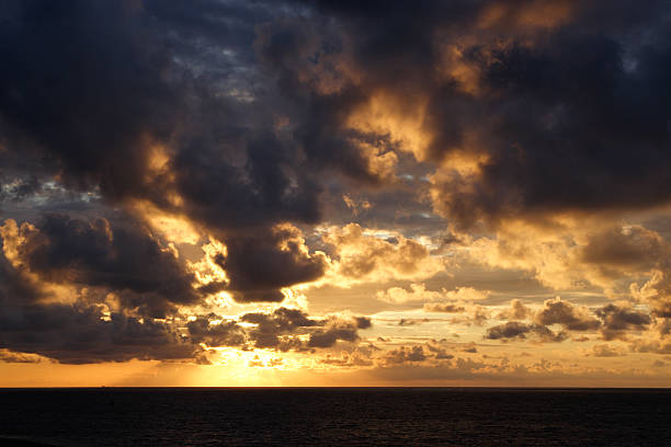 Sunset at sea stock photo