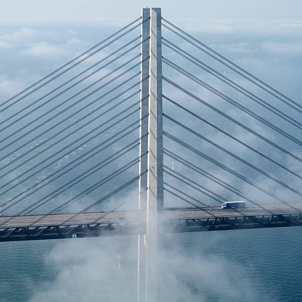 Oresund bridge Aerial view of the bridge between Denmark and Sweden. Truck passing by in high speed oresund bridge stock pictures, royalty-free photos & images