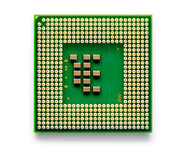 A close up of an electronic chip used for technology  Low power microprocessor for portable computers - isolated on white with soft shadow + clipping path computer chip stock pictures, royalty-free photos & images