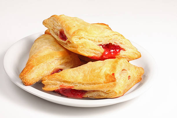 Cherry Turnover Cherry turnover right out of the oven. strudel stock pictures, royalty-free photos & images