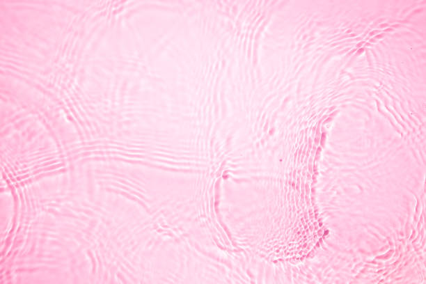Pink rippled water background