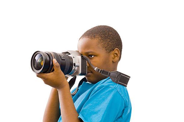 Boy taking a picture stock photo
