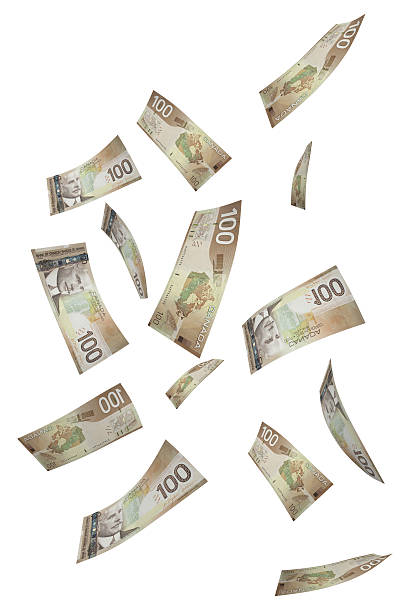 Falling Hundred Dollar Bills stock photo