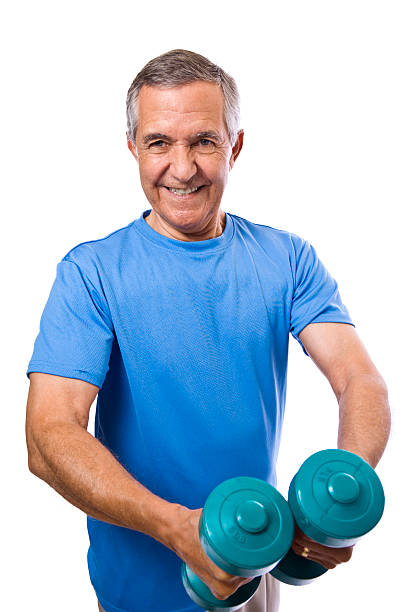 istock Senior male wearing workout attire holding dumbbells making face 174630092