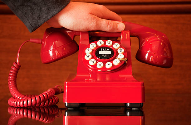 istock Picking up the crisis telephone 174630582