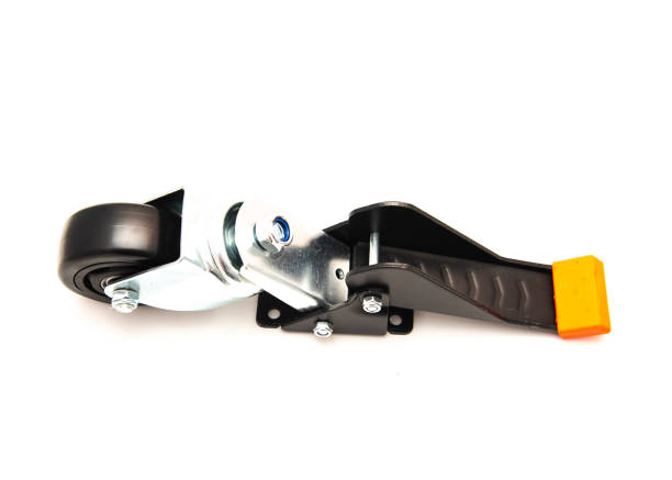 istock Pushing casters with orange rubber sleeve down position, heavy-duty retractable accessory for workbenches machinery and tables isolated on white background clipping path 1746315163