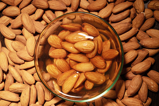 Soaked almonds in bowl, drenched almonds good source for protein and fiber