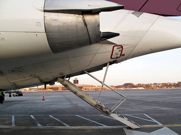 istock Airplane With Stairs Down On Tarmac 174632209