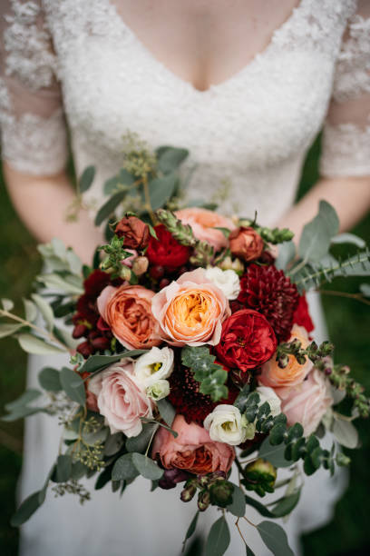 istock the bride holds a colorful wedding bouquet in her hand 1746326748