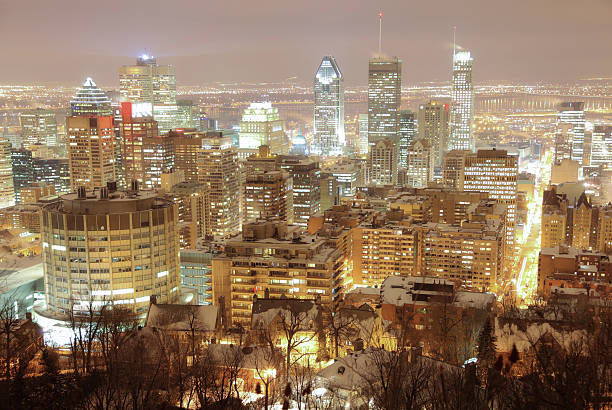 Illuminating Montreal at Night  buzbuzzer montreal city stock pictures, royalty-free photos & images
