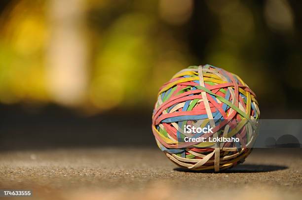 Rubberband Ball Stock Photo - Download Image Now - Rubber Band, Sphere, Cement