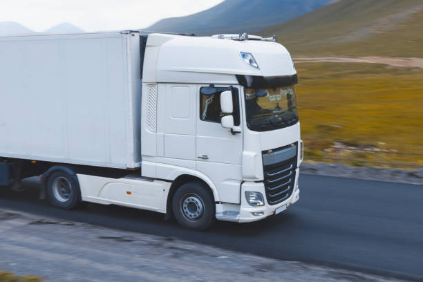 istock semi truck fast driving on the road 1746337188