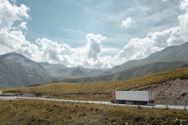 istock freight truck on the mountain pass road 1746338361