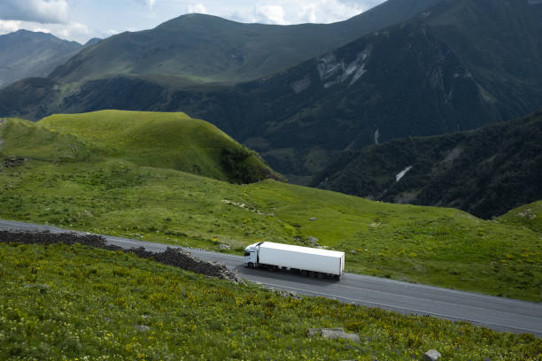 istock freight truck on the mountain pass road 1746338376