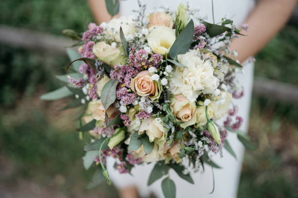 istock the bride holds a colorful wedding bouquet in her hands 1746339074