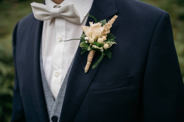 istock groom with suit, bow tie and lapel flower 1746339622