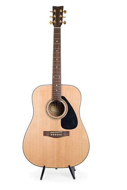 istock Acoustic guitar on a stand 174634036