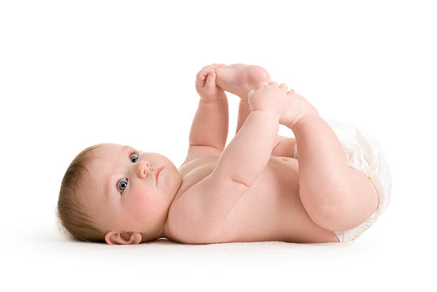 istock Cute Baby. Naked Lying Down Isolated Cheerful 174634449