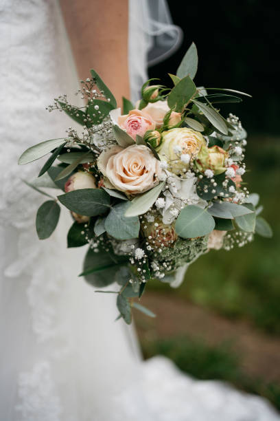 istock the bride holds a colorful wedding bouquet in her hand 1746351855