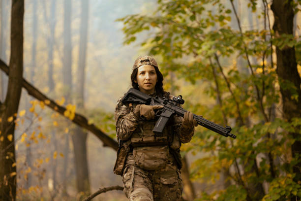 istock Woman in army. Tactical exercise. 1746360965