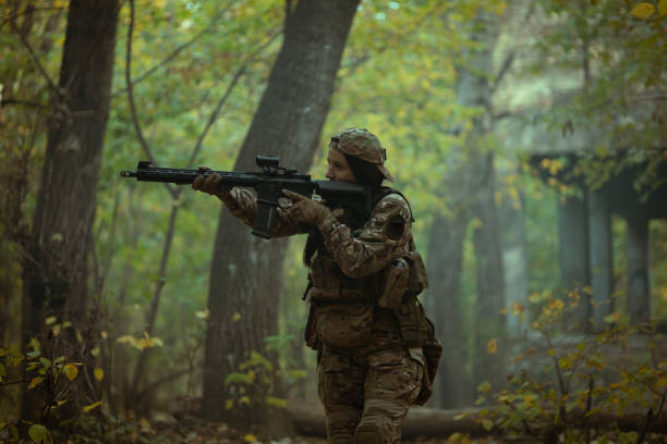 istock Woman in army. Tactical exercise. 1746361041