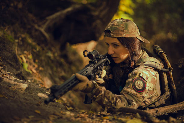 istock Woman in army. Tactical exercise. 1746362278